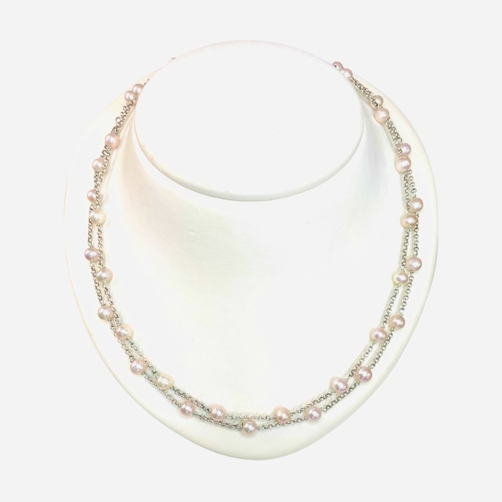 Pink pearl necklace on a sterling silver chain.